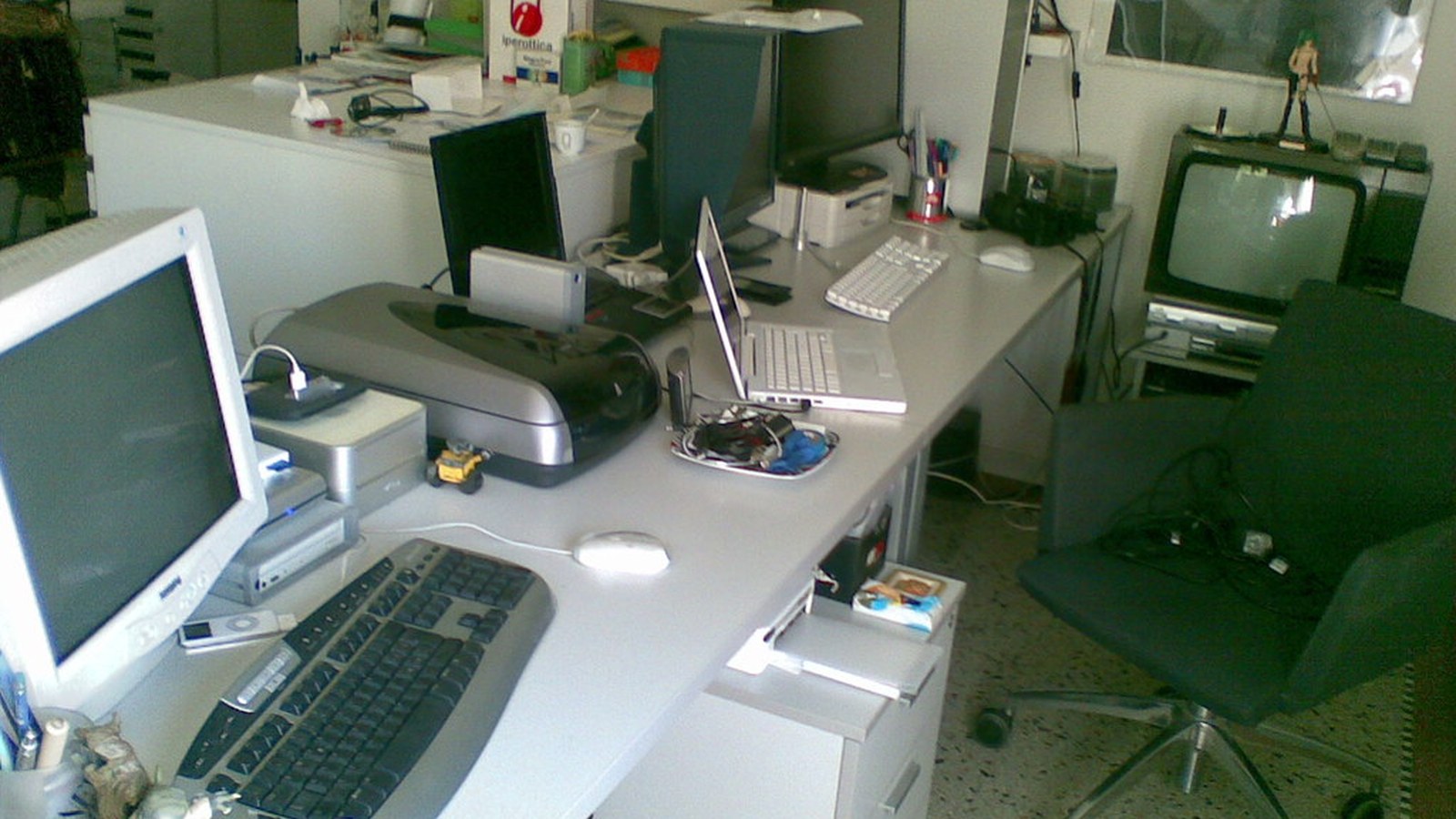 How to Set Up a Conference Room Credenza So Remotes and Adapters Stop Disappearing